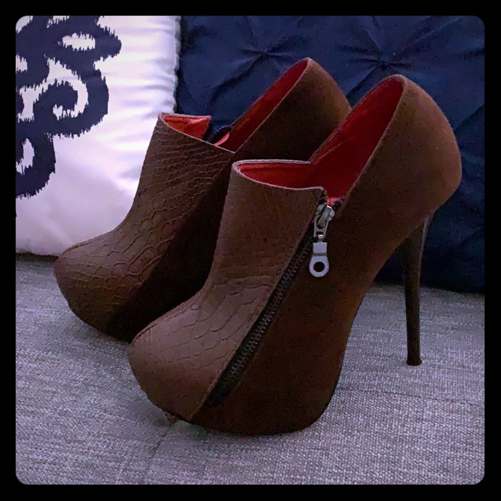 Stiletto booties by Maker’s